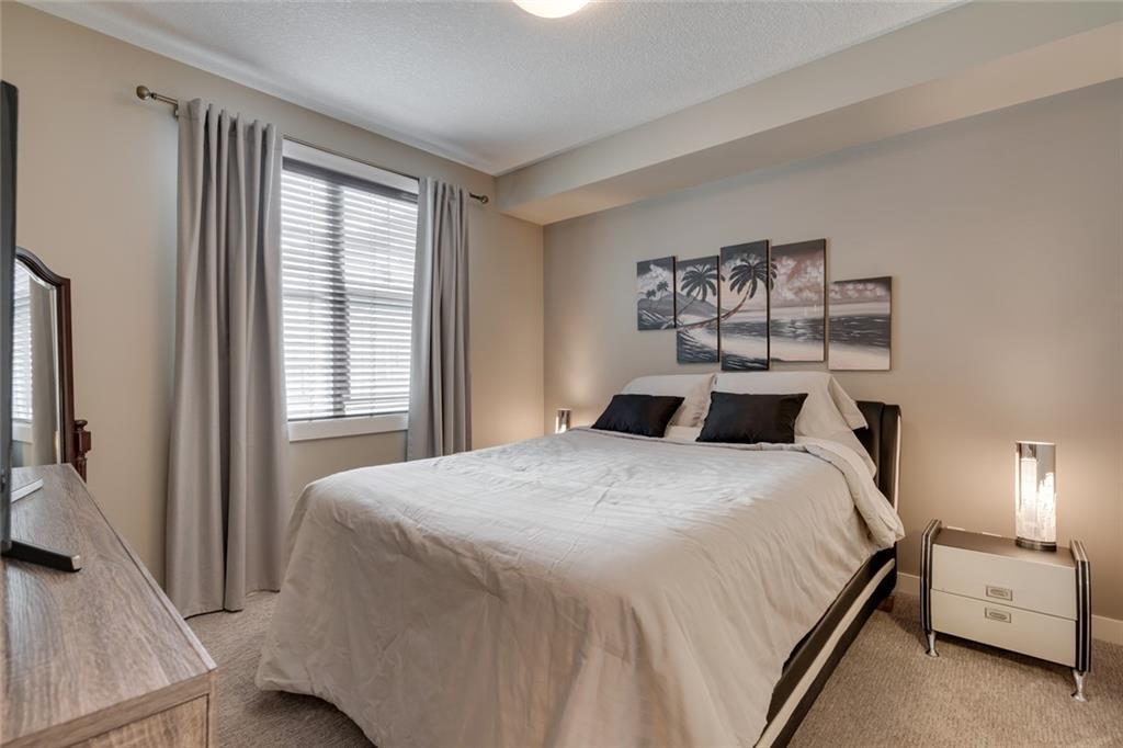 Spacious primary bedroom retreat with walk-in closet access.