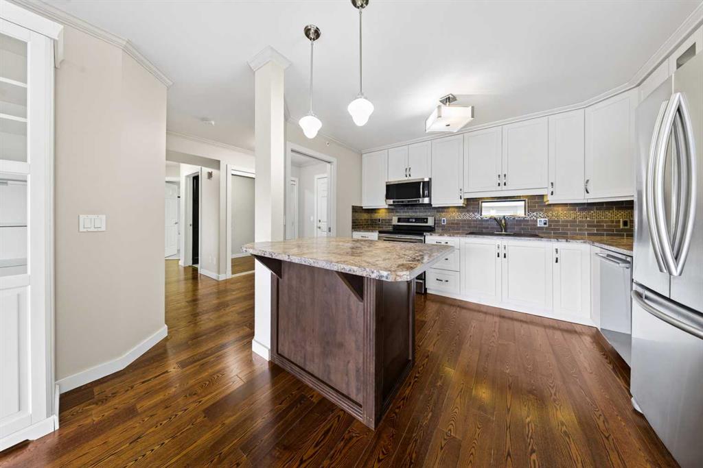 Open-concept kitchen and dining area with island